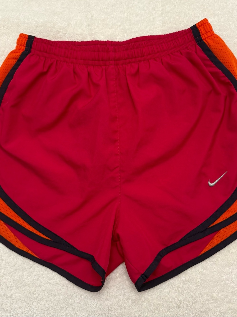 Nike Women's Red Athletic Shorts with Orange Accents